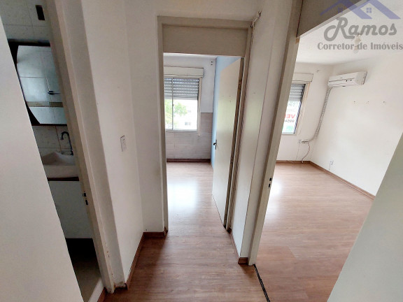 Imagem Imóvel com 2 Quartos à Venda, 50 m² em Vila Nova - Porto Alegre Imagem Imóvel com 2 Quartos à Venda, 50 m² em Vila Nova - Porto Alegre