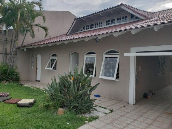 Imagem Casa com 3 Quartos à Venda, 232 m² em Uberaba - Curitiba
