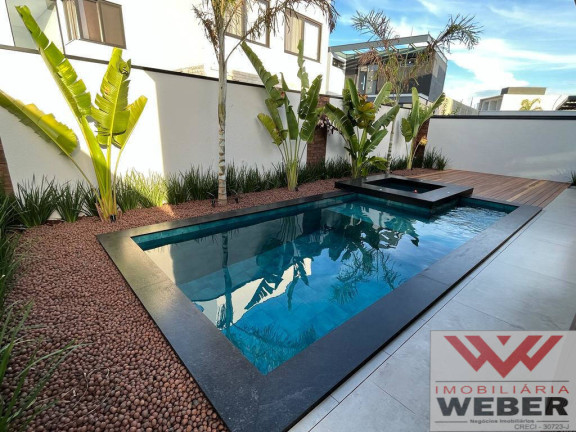 Imagem Casa de Condomínio com 3 Quartos à Venda, 415 m² em Alphaville Nova Esplanada - Votorantim