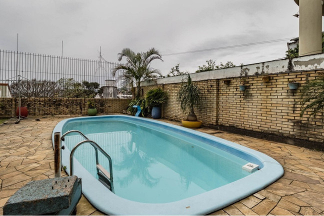 Imagem Casa com 3 Quartos à Venda, 464 m² em Santo Antônio - Porto Alegre Imagem Casa com 3 Quartos à Venda, 464 m² em Santo Antônio - Porto Alegre