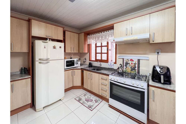 Imagem Casa com 3 Quartos à Venda, 119 m² em Igara - Canoas Imagem Casa com 3 Quartos à Venda, 119 m² em Igara - Canoas