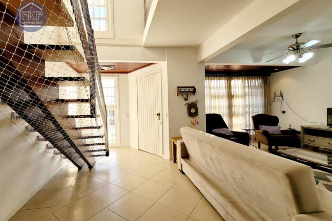 Imagem Casa com 3 Quartos à Venda, 266 m² em Vila Nova - Porto Alegre
