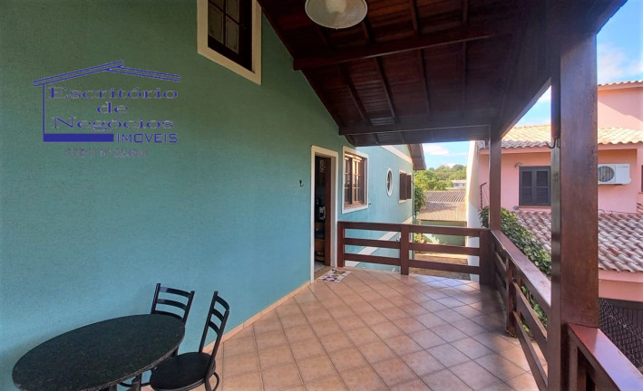 Imagem Casa com 4 Quartos à Venda, 260 m² em Vila Nova - Porto Alegre Imagem Casa com 4 Quartos à Venda, 260 m² em Vila Nova - Porto Alegre