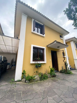 Imagem Casa de Condomínio com 3 Quartos à Venda, 102 m² em Partenon - Porto Alegre Imagem Casa de Condomínio com 3 Quartos à Venda, 102 m² em Partenon - Porto Alegre