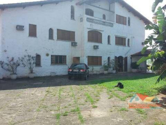 Imagem Sobrado com 8 Quartos à Venda, 507 m² em Massaguaçu - Caraguatatuba