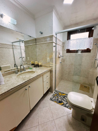 Imagem Casa com 3 Quartos para Temporada, 390 m² em Bertioga