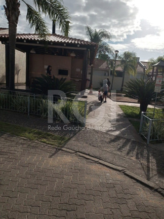 Imagem Casa de Condomínio com 2 Quartos à Venda, 56 m² em Restinga - Porto Alegre Imagem Casa de Condomínio com 2 Quartos à Venda, 56 m² em Restinga - Porto Alegre