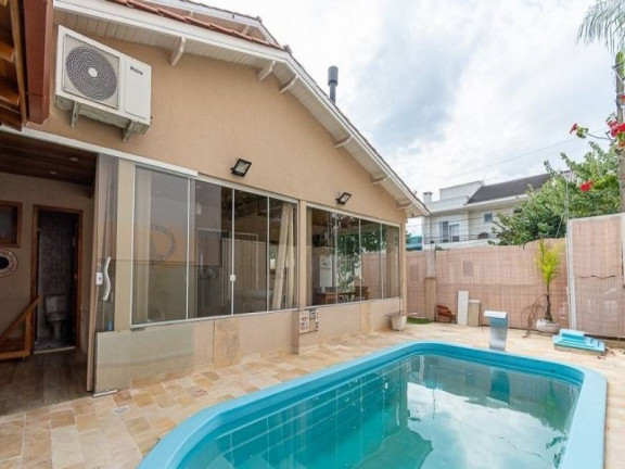 Imagem Casa com 3 Quartos à Venda, 164 m² em Ecoville - Porto Alegre Imagem Casa com 3 Quartos à Venda, 164 m² em Ecoville - Porto Alegre