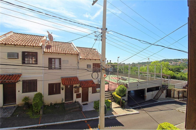 Imagem Casa com 2 Quartos à Venda, em Vila Nova - Porto Alegre Imagem Casa com 2 Quartos à Venda, em Vila Nova - Porto Alegre