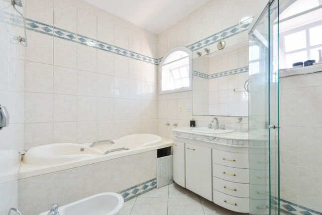 Imagem Casa com 4 Quartos à Venda, 450 m² em Caxingui - São Paulo