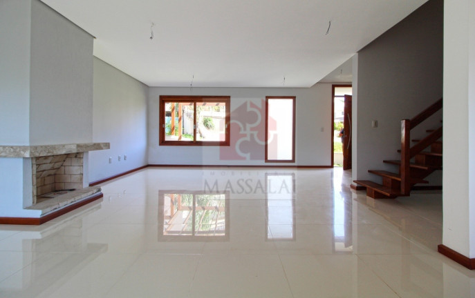 Imagem Casa com 3 Quartos à Venda, 240 m² em Vila Nova - Porto Alegre Imagem Casa com 3 Quartos à Venda, 240 m² em Vila Nova - Porto Alegre