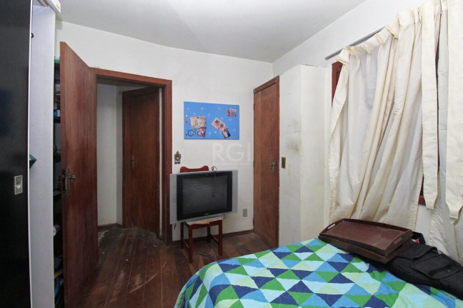 Imagem Casa com 4 Quartos à Venda, 300 m² em Glória - Porto Alegre Imagem Casa com 4 Quartos à Venda, 300 m² em Glória - Porto Alegre