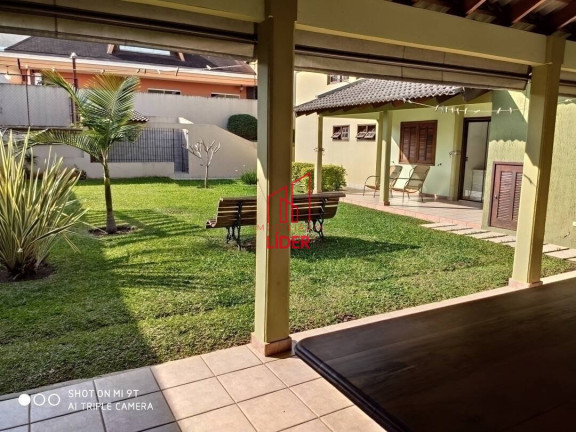 Imagem Casa com 4 Quartos à Venda, 320 m² em Curitiba Imagem Casa com 4 Quartos à Venda, 320 m² em Curitiba
