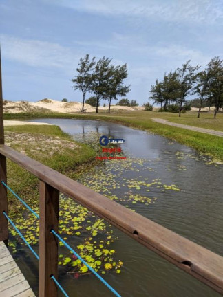 Imagem Terreno à Venda, 299 m² em Capão Novo Village  - Capão Da Canoa