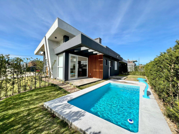 Imagem Casa com 4 Quartos à Venda, em Centro - Xangri-lá Imagem Casa com 4 Quartos à Venda, em Centro - Xangri-lá
