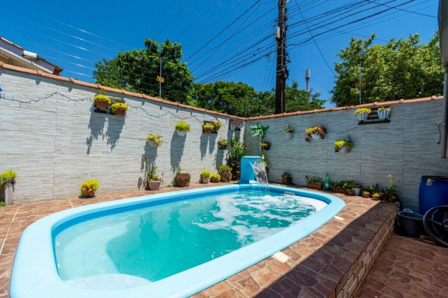Imagem Casa com 3 Quartos à Venda, 62 m² em São José - Canoas Imagem Casa com 3 Quartos à Venda, 62 m² em São José - Canoas