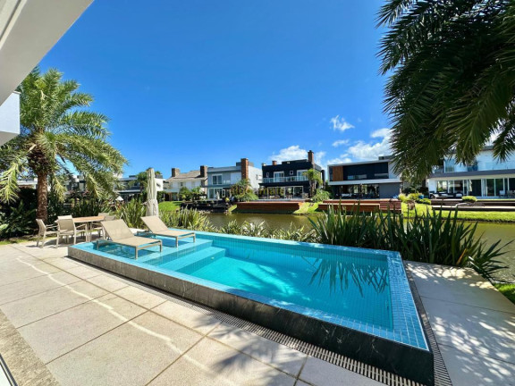 Imagem Casa com 5 Quartos à Venda, 373 m² em Condominio Malibu Beach Residence - Xangri-lá Imagem Casa com 5 Quartos à Venda, 373 m² em Condominio Malibu Beach Residence - Xangri-lá