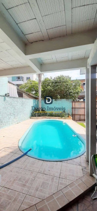 Imagem Sobrado com 6 Quartos à Venda, 294 m² em Camobi - Santa Maria