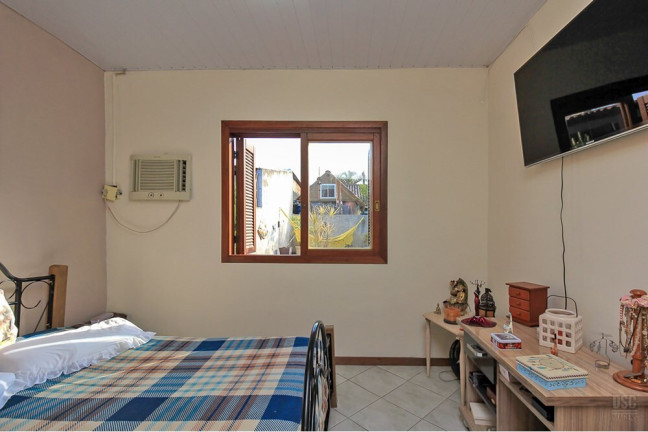 Imagem Casa com 2 Quartos à Venda, 41 m² em Hípica - Porto Alegre Imagem Casa com 2 Quartos à Venda, 41 m² em Hípica - Porto Alegre