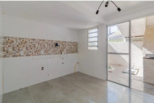 Imagem Casa de Condomínio com 2 Quartos à Venda, 67 m² em Sarandi - Porto Alegre