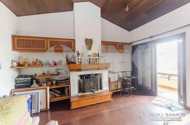 Imagem Casa com 5 Quartos à Venda, 530 m² em Jardim Lindóia - Porto Alegre Imagem Casa com 5 Quartos à Venda, 530 m² em Jardim Lindóia - Porto Alegre