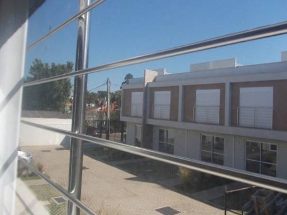 Imagem Sobrado com 2 Quartos à Venda, 117 m² em Parque Santa Fé - Porto Alegre
