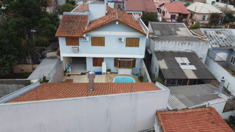 Imagem Imóvel com 4 Quartos à Venda, em Glória - Porto Alegre Imagem Imóvel com 4 Quartos à Venda, em Glória - Porto Alegre