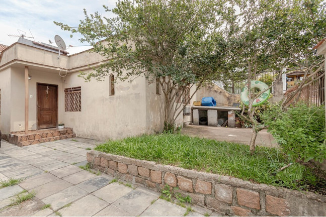 Imagem Casa com 4 Quartos à Venda, 170 m² em Vila Nova - Porto Alegre Imagem Casa com 4 Quartos à Venda, 170 m² em Vila Nova - Porto Alegre