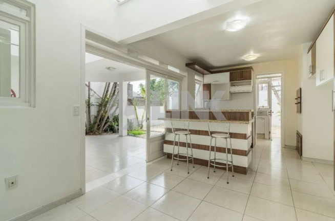 Imagem Casa com 4 Quartos à Venda, 250 m² em Menino Deus - Porto Alegre