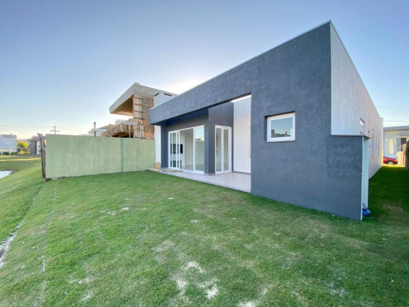 Imagem Casa com 4 Quartos à Venda, 183 m² em Capão Da Canoa - Capao Da Canoa