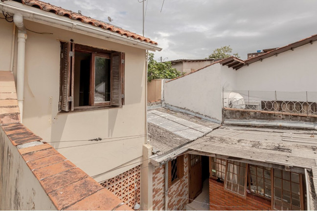 Imagem Casa com 4 Quartos à Venda, 170 m² em Vila Nova - Porto Alegre Imagem Casa com 4 Quartos à Venda, 170 m² em Vila Nova - Porto Alegre