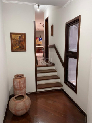 Imagem Casa com 4 Quartos à Venda, 480 m² em Santo Antônio - Porto Alegre