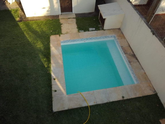 Imagem Casa de Condomínio com 5 Quartos à Venda, 175 m²