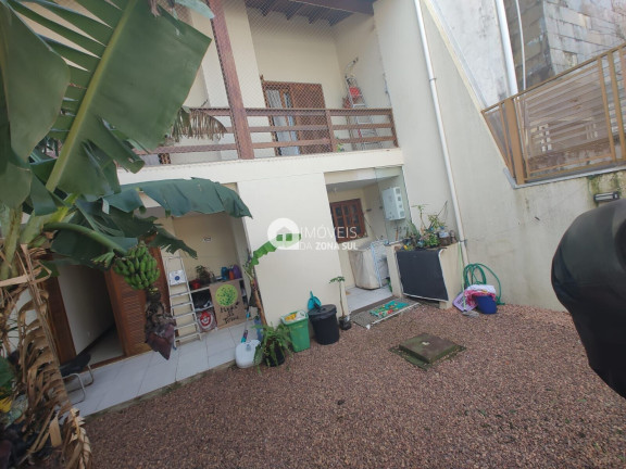 Imagem Casa com 3 Quartos à Venda, 168 m²