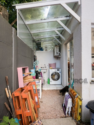 Imagem Casa com 4 Quartos à Venda,  em Vila Nova - Porto Alegre