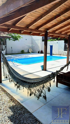 Imagem Casa com 6 Quartos para Temporada, em Canasvieiras - Florianópolis Imagem Casa com 6 Quartos para Temporada, em Canasvieiras - Florianópolis