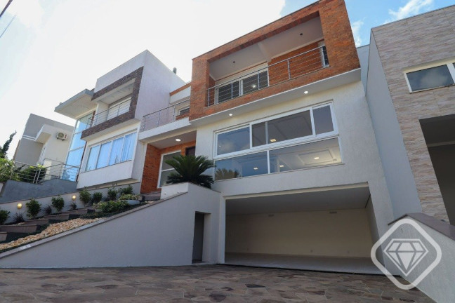 Imagem Casa de Condomínio com 3 Quartos à Venda, em Hípica - Porto Alegre Imagem Casa de Condomínio com 3 Quartos à Venda, em Hípica - Porto Alegre