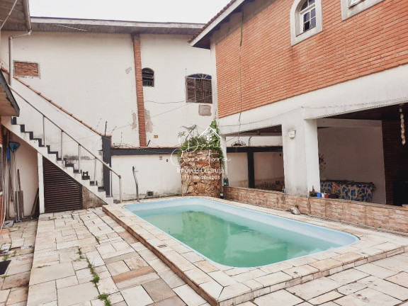 Imagem Sobrado com 6 Quartos à Venda, 297 m² em Vila Santa Rosa - Guarujá