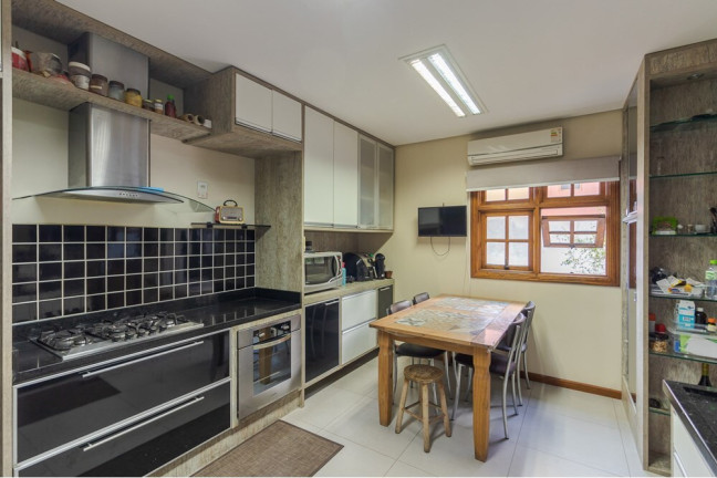 Imagem Casa de Condomínio com 4 Quartos à Venda, 238 m² em Bela Vista - Porto Alegre
