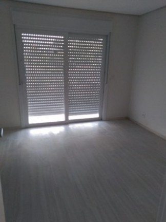 Imagem Sobrado com 3 Quartos à Venda, 140 m² em Jardim Itu - Porto Alegre
