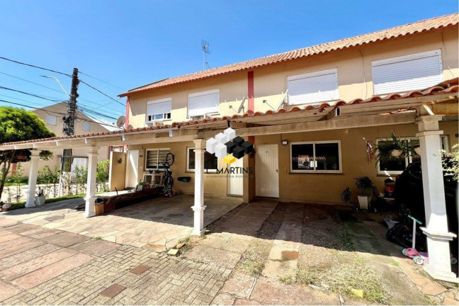 Imagem Casa com 2 Quartos à Venda, 103 m² em Rio Branco - Canoas Imagem Casa com 2 Quartos à Venda, 103 m² em Rio Branco - Canoas