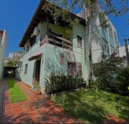 Imagem Casa com 3 Quartos à Venda, 178 m² em Santana - Porto Alegre Imagem Casa com 3 Quartos à Venda, 178 m² em Santana - Porto Alegre
