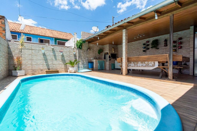 Imagem Casa com 4 Quartos à Venda, 165 m² em Igara - Canoas Imagem Casa com 4 Quartos à Venda, 165 m² em Igara - Canoas