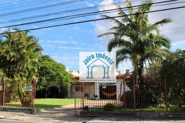Imagem Casa com 4 Quartos à Venda, 325 m² em Centro - Osório Imagem Casa com 4 Quartos à Venda, 325 m² em Centro - Osório