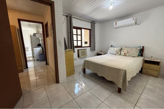 Imagem Casa com 2 Quartos à Venda, 98 m² em Guajuviras - Canoas Imagem Casa com 2 Quartos à Venda, 98 m² em Guajuviras - Canoas