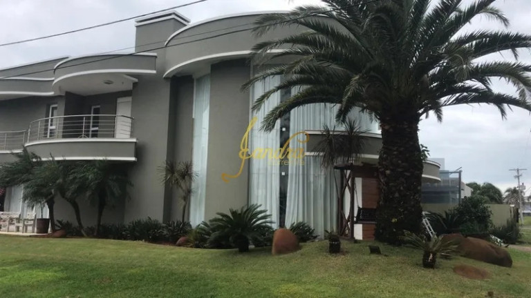 Imagem Casa de Condomínio com 5 Quartos à Venda, 660 m² em Centro - Xangri-la