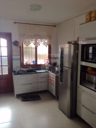 Imagem Casa com 3 Quartos à Venda, 130 m² em Vila Nova - Porto Alegre Imagem Casa com 3 Quartos à Venda, 130 m² em Vila Nova - Porto Alegre