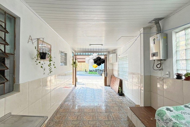 Imagem Casa com 2 Quartos à Venda, 101 m² em Vila Nova - Porto Alegre Imagem Casa com 2 Quartos à Venda, 101 m² em Vila Nova - Porto Alegre