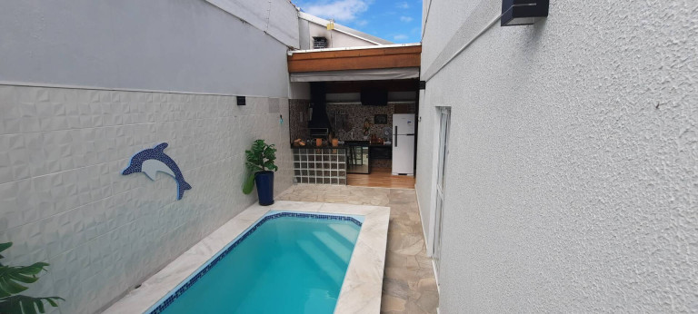 Imagem Casa de Condomínio com 2 Quartos à Venda, 110 m² em Massaguaçu - Caraguatatuba