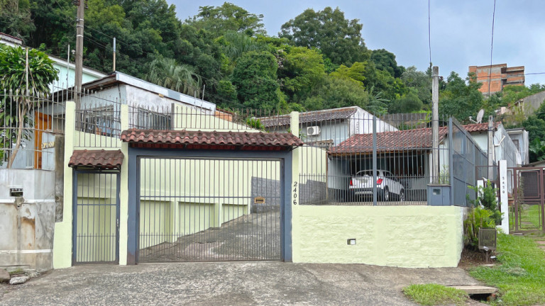 Imagem Casa com 3 Quartos à Venda, 156 m² em Vila Nova - Porto Alegre Imagem Casa com 3 Quartos à Venda, 156 m² em Vila Nova - Porto Alegre